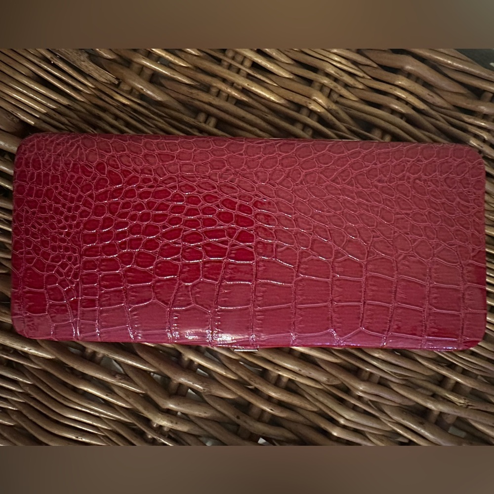 Faux red snakeskin clutch